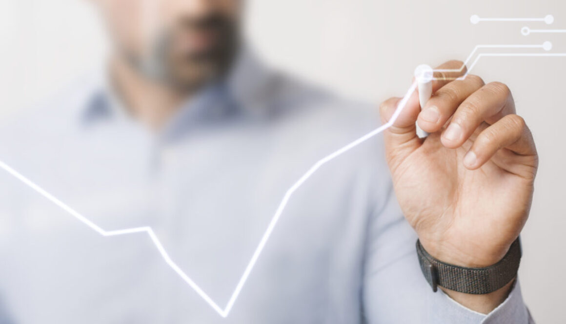 Man giving a business presentation using a futuristic digital pe