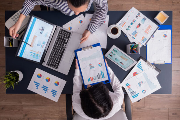 Top view of manager and employee doing teamwork